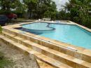 Piscina 60mil L com rea de criana